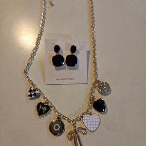 Dainty charm necklace with 7 charms in black/white with coordinating earrings